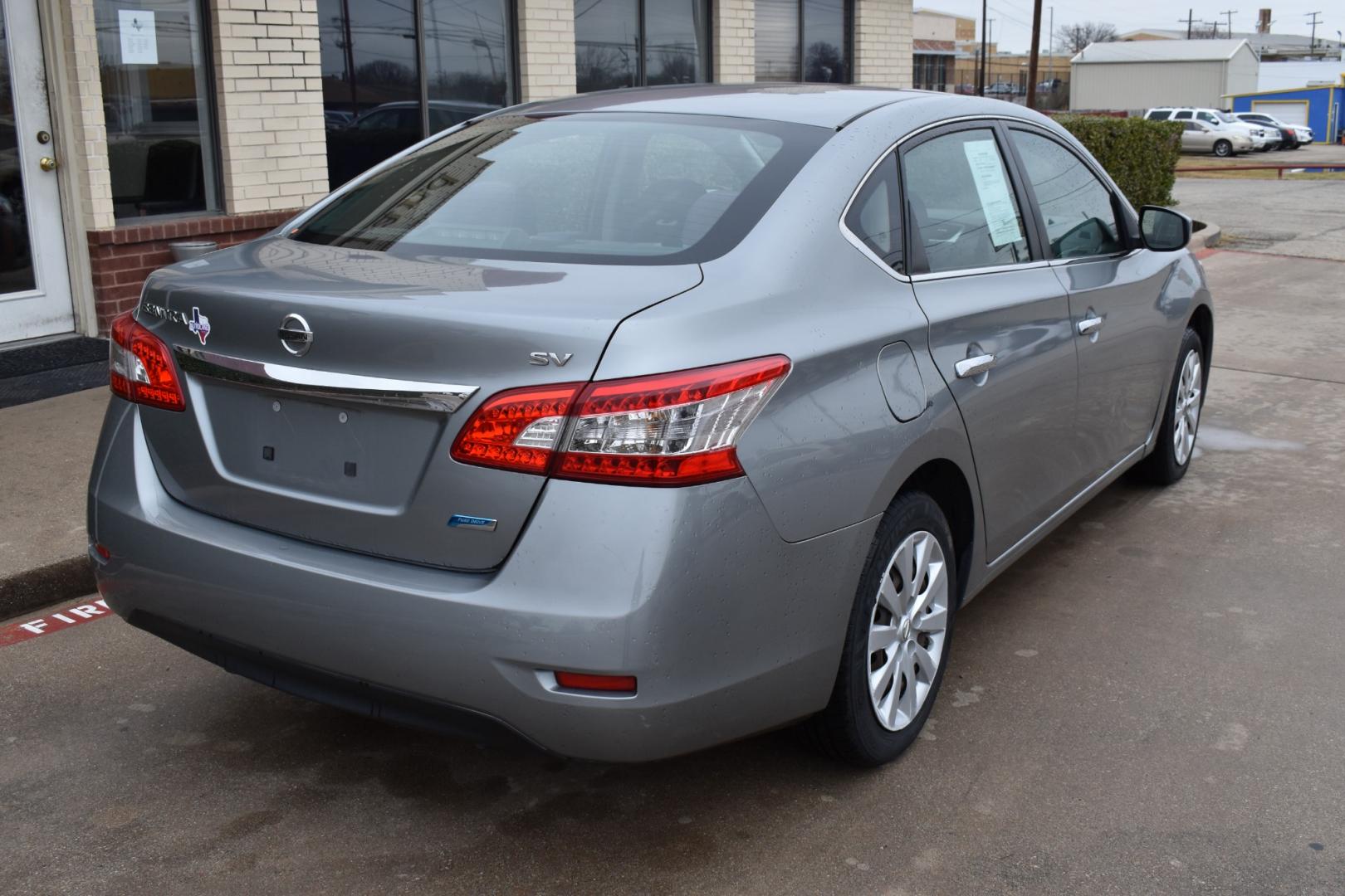 2014 Gray /Black Nissan Sentra S 6MT (3N1AB7AP6EY) with an 1.8L L4 SFI DOHC 16V engine, 6-Speed Manual transmission, located at 5925 E. BELKNAP ST., HALTOM CITY, TX, 76117, (817) 834-4222, 32.803799, -97.259003 - Deciding whether to buy a specific car model, such as the 2014 Nissan Sentra Sedan, depends on various factors, including your personal preferences, budget, and specific needs. Here are some considerations that might help you make a decision: Fuel Efficiency: The 2014 Nissan Sentra is known for its - Photo#4